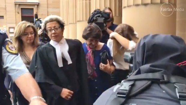 Judith Obeid, centre, leaves court after her husband Eddie was jailed. 