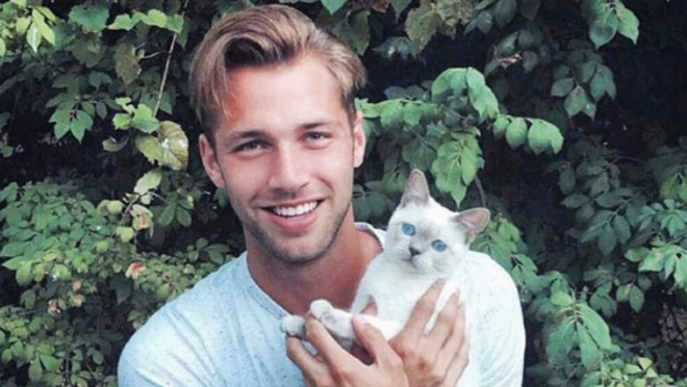 If you like conventionally attractive men holding conventionally apathetic cats, this Instagram account has you covered.