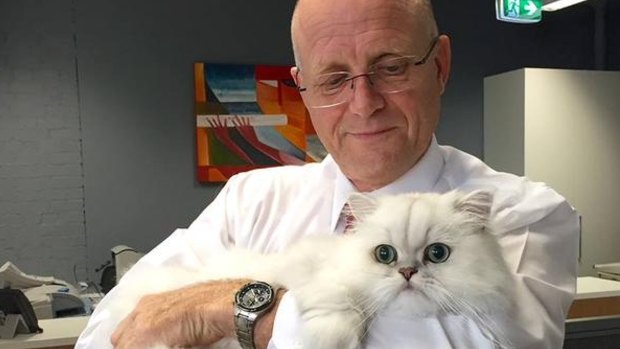 Senator David Leyonhjelm and his cat Oliver. 