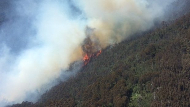 A blaze at Granuaille Mountain, near Thredbo, breached containment lines on Sunday morning.
