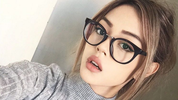 Lily May Mac modelling Oscar Wylee glasses in her Instagram feed.