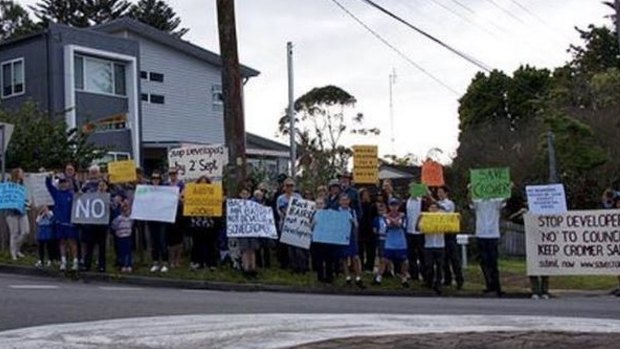 Residents protest against the planned boarding house gather in Cromer.