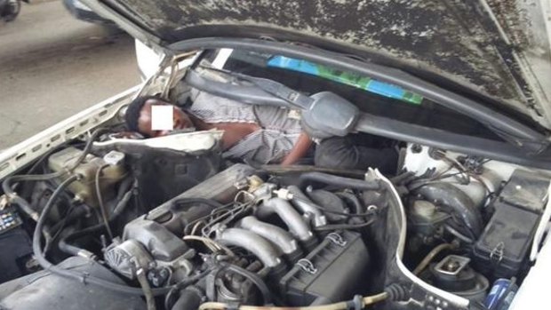 A migrant from Guinea was found hiding in a car engine in a bid to enter Spain from Morocco.