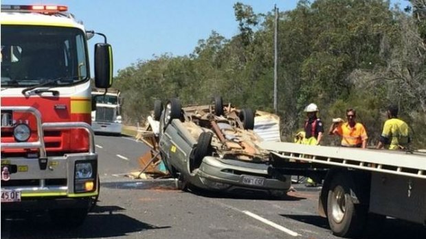 Two elderly people escaped with minor injuries after rolling their car and caravan on the Isis Highway near Childers.