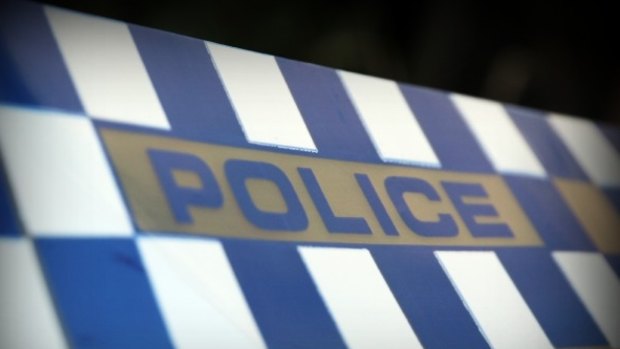 Four men armed with a gun and other weapons allegedly charged into a Woodridge unit on Monday morning.