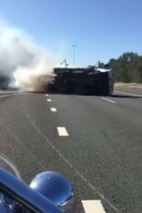 A truck has rolled over on the Sunshine Motorway near Mountain Creek.