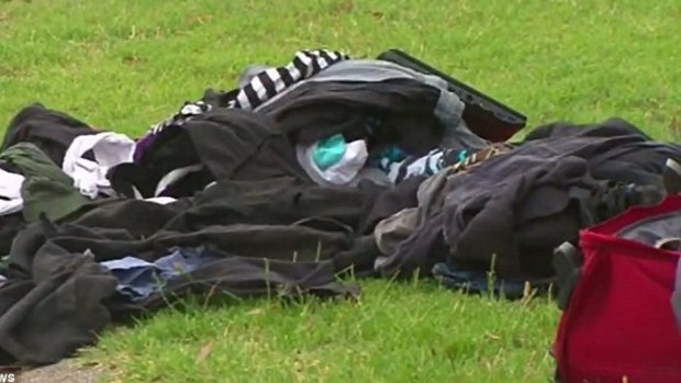 Men's clothes were strewn along the side of the road after Sunday's fatal incident.