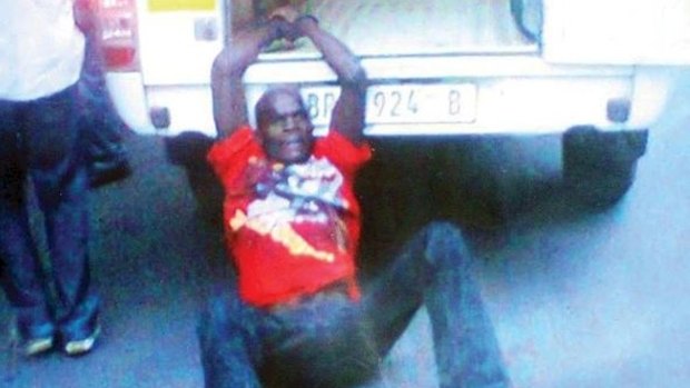 Mido Macia, dragged behind a police truck in Johannesburg in 2013.

