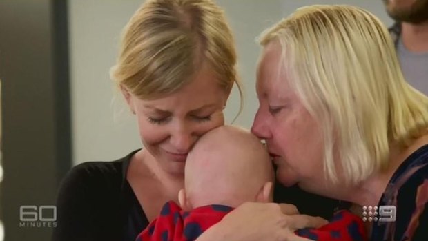 Sally Faulker is reunited with her baby, Eli, and her mother, Karen.