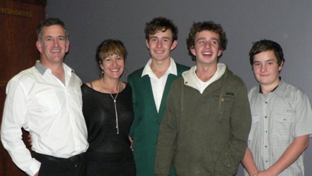 Liam Davies with his parents Tim and Lhani and brothers Connor and Keegan in a family photo.