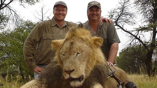 Hunter Walter James Palmer, left, with another lion he killed.