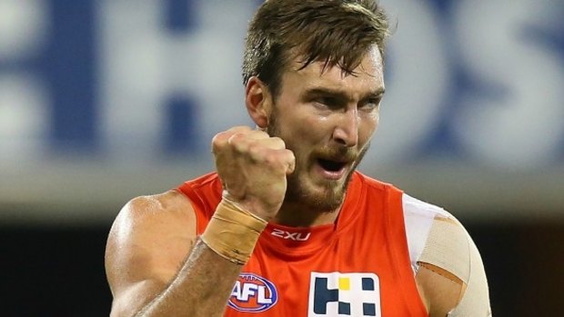 Hot water: The Gold Coast's Charlie Dixon has found strife after breaking a no-booze ban.