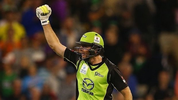 You beauty: Sydney Thunder batsman Ben Rohrer celebrates his match-winning six that delivered the side their first BBL title.