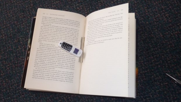 The phone discovered inside the spine of a book earlier this month.