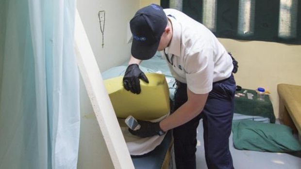 Corrective Services officers search for contraband at Parklea prison.