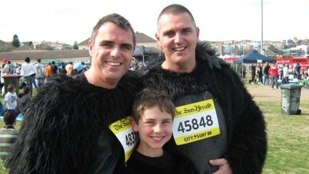 Extra distance: Rob Stanley-Jones with son Jack and brother Paul at a previous City2Surf.
