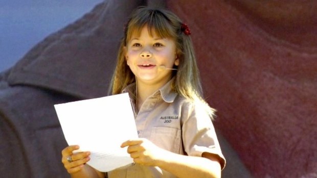 Bindi Irwin, daughter of Australian environmentalist and television personality Steve Irwin, reads out a tribute at a memorial service for her father at Australia Zoo in 2006.