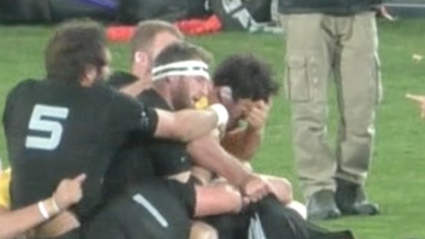 No charge: Owen Franks appears to gouge the eye of Kane Douglas.