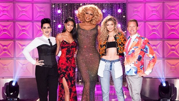 RuPaul (centre) with celebrity judges on <i>RuPaul's Drag Race</i>.