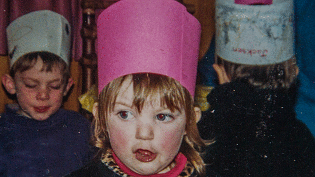 Annie, wearing the pink hat, at her 2nd birthday party in August 2000. She died in December.