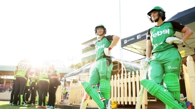 Meg Lanning (left) and Emma Inglis get ready to bat against Sydney Thunder