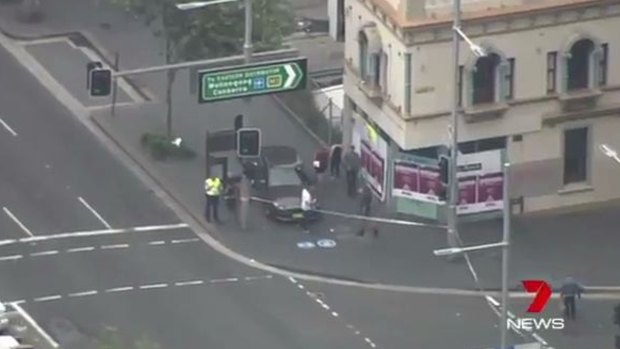 The scene at the intersection of William and Bourke streets, Woolloomooloo, where an elderly pedestrian was killed.