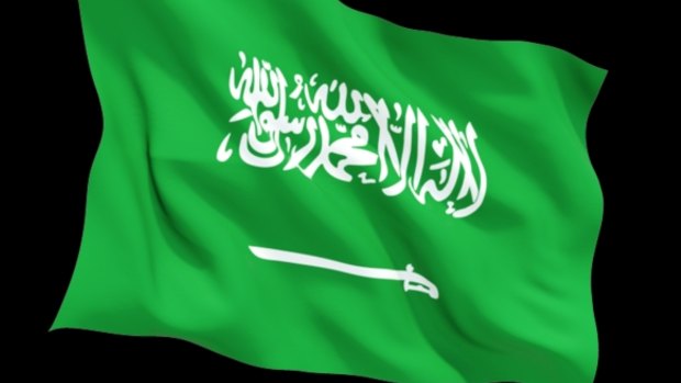 The flag of Saudi Arabia, which features the shahada (Islamic testament of faith) and a sword.
