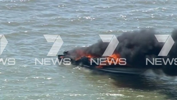 Flames tear through a boat in the southern Moreton Bay.