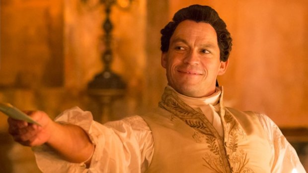 Dominic West gleams and beams as Valmont in Les Liaisons Dangereuses for National Theatre Live.