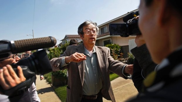 Is this bitcoin's creator? Journalists surround Satoshi Nakamoto as he walks from his home in Temple City.
