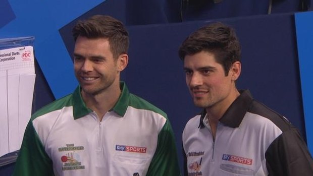 Jimmy Anderson and Alastair Cook are all smiles at the darts.