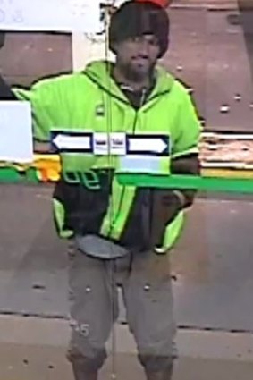One of the men wanted for questioning over the robberies.