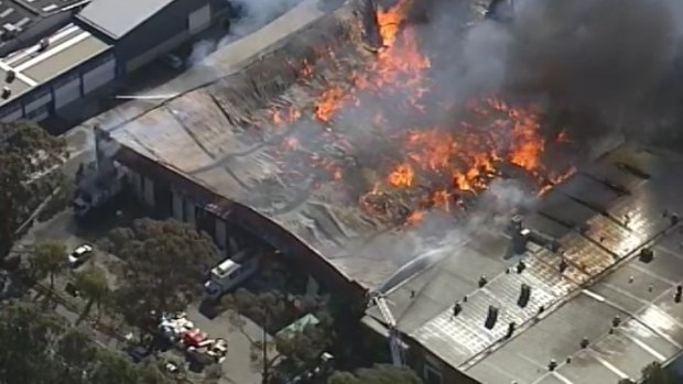 Fire destroys a furniture warehouse in Yennora.