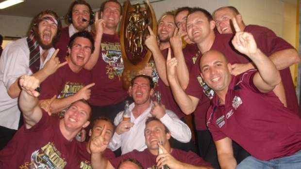 Robert Melhem, right with finger raised, celebrating with Manly players after they won the grand final in 2008.