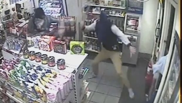 The service station attendant saw the men enter the store on CCTV cameras before arming himself and attempting to fight the men off. 