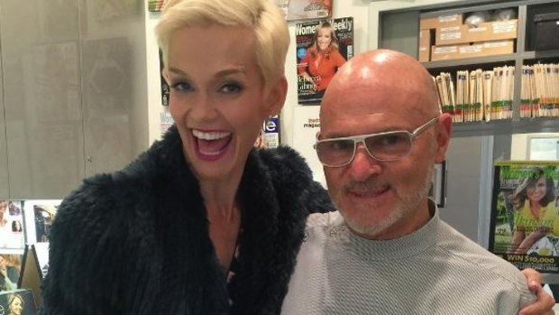 Dr David Carr, pictured with Jessica Rowe, has denied claims he harassed employees.