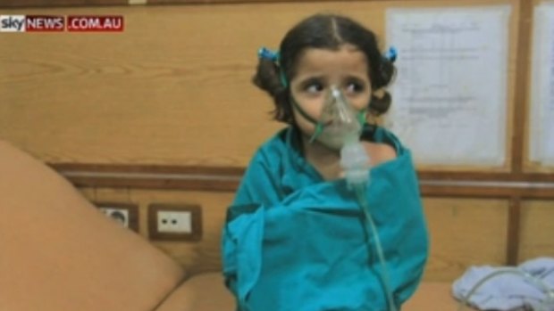 A young girl suffering the effects of a suspected gas attack in Aleppo this week.