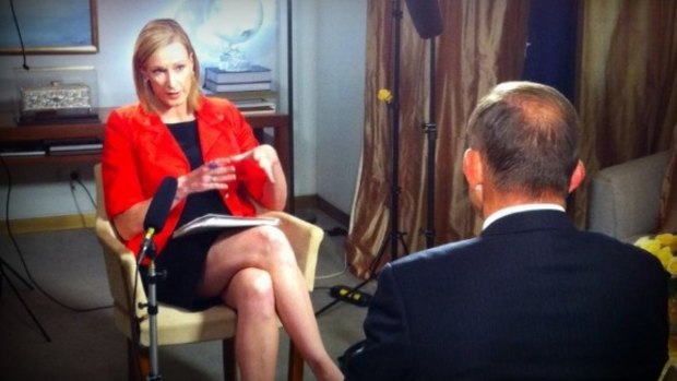 Leigh Sales questions Tony Abbott on the <i>7.30 Report</i>.