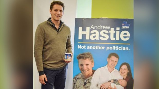 Canning MP Andrew Hastie was sacked from the Army Reserve after he refused to remove photos of himself in uniform from election campaign material.