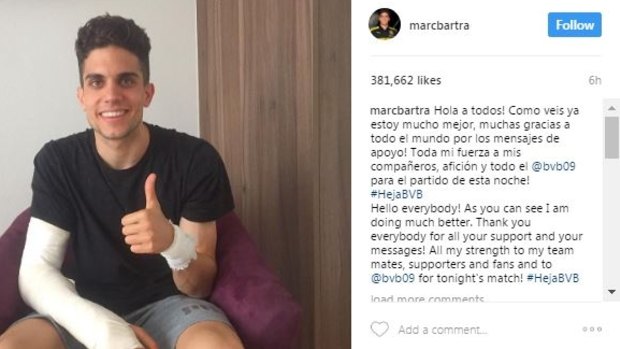 Encouraging signs: Injured Borussia Dortmund player Marc Bartra gives the thumbs up after surgery.