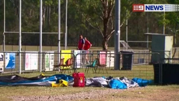 The aftermath of the accident at the Queensland Gaelic Football & Hurling Association headquarters in Willawong, where a toddler fell out of an airborne jumping castle.