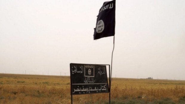 The flag of Islamic State in an area west of Kirkuk in September. 