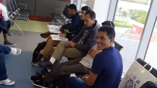 The refugees accepted for resettlement in the US in the departure lounge of Port Moresby airport. 