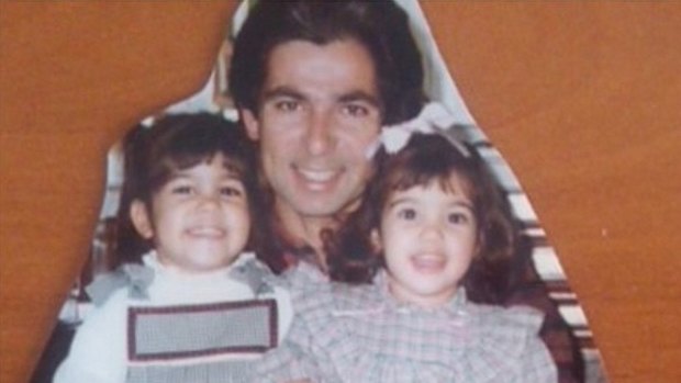 Family man: The late Robert Kardashian with Kourtney and Kim Kardashian as children.