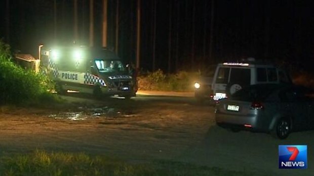 Police investigating the death of Tia Landers look through bushland in Beerburrum