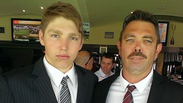 Duncan Wilmott with his father Ryan on Melbourne Cup day, 2015.