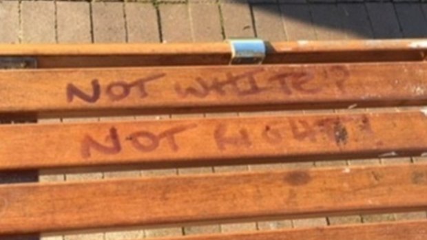 A racist slogan on a bench at Bondi Beach.