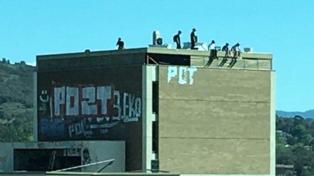 People on the roof of the abandoned Woden building this week.