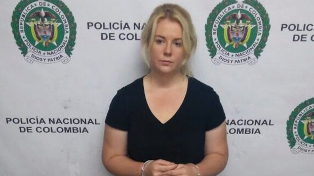 Colombian police released this photo of Cassandra Sainsbury with the drugs she is said to have smuggled.