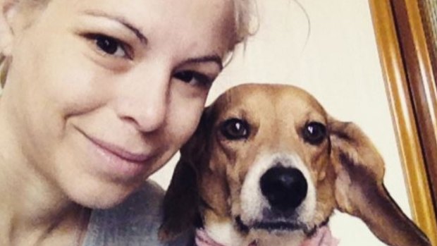American expat Ashley Ann Olsen was well known in Florence for her beagle, Scout.